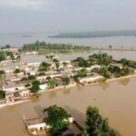 A general view of a flooded area after heavy monsoon rains is pictured from atop a bridge in Charsadda district in the Khyber Pakhtunkhwa province of Pakistan on August 27, 2022. - Heavy rain pounded much of Pakistan on August 26 after the government declared an emergency to deal with monsoon flooding it said had affected more than 30 million people. (Photo by Abdul MAJEED / AFP) (Photo by ABDUL MAJEED/AFP via Getty Images)